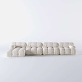 Velvet 4-seater sofa with chaise lounge, perfect for spacious living rooms